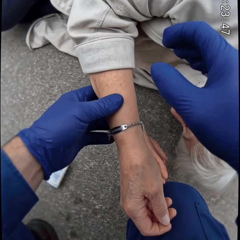 Woman wearing the WristAlert Wrist-Check Bracelet, engraved with 'Blood Thinner'